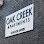 Oak Creek Apartments logo